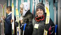 children with Nordic skis at Sagawau Environmental Learning Center