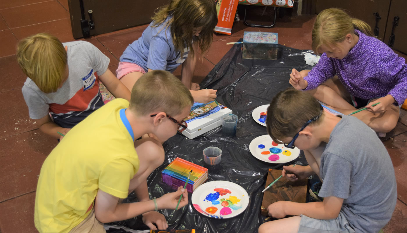 children painting inside Thatcher Woods Pavilion