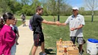 Trent Sinnet selling honey at Swallow Cliff Woods